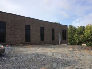 Left side of the building.