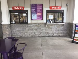The pick-up and order window of the ice cream shop.