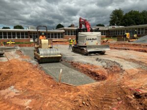 Workers working on the school.
