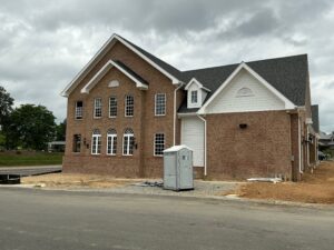 Left side of the building.