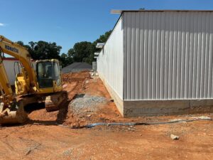 Left side of the storage units. 