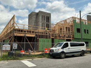 Right side of the back side of the building.