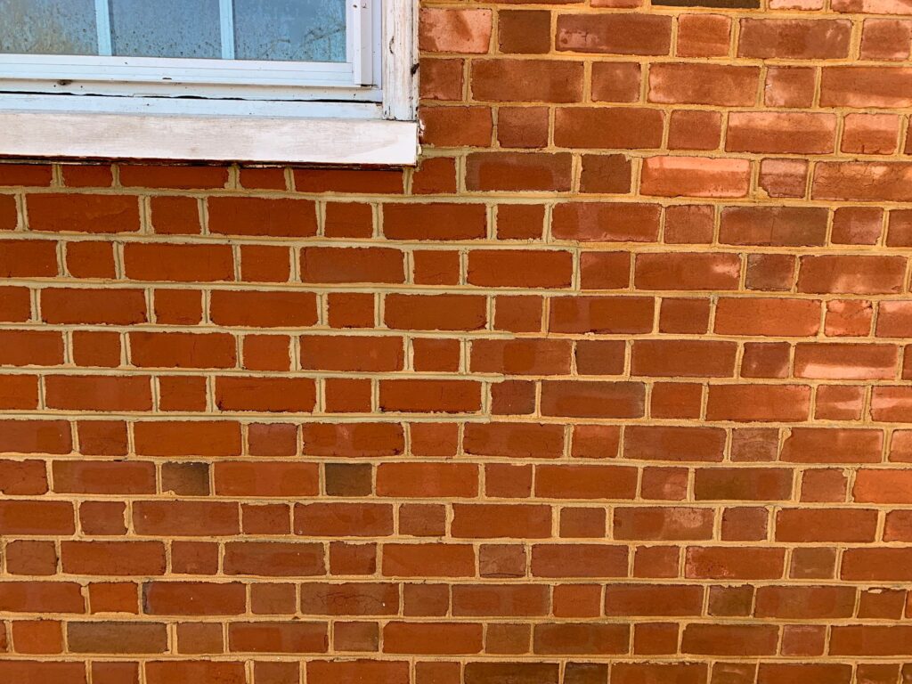 Brick repaired on building.