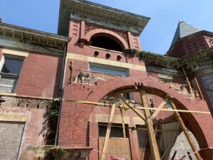The brick being repaired in the Dunnington Mansion. 