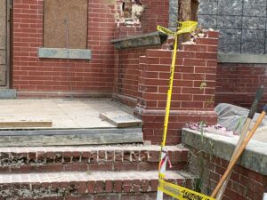 The brick being repaired on the Dunnington Mansion. 