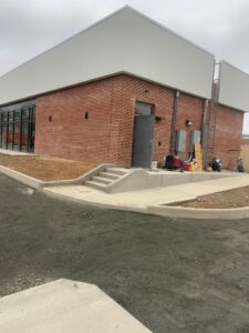 Right side of the building. 