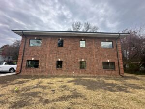 Left side of the office building. 